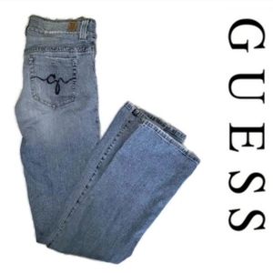 GUESS womens size 28 straight leg slightly stretchy midwash jeans.